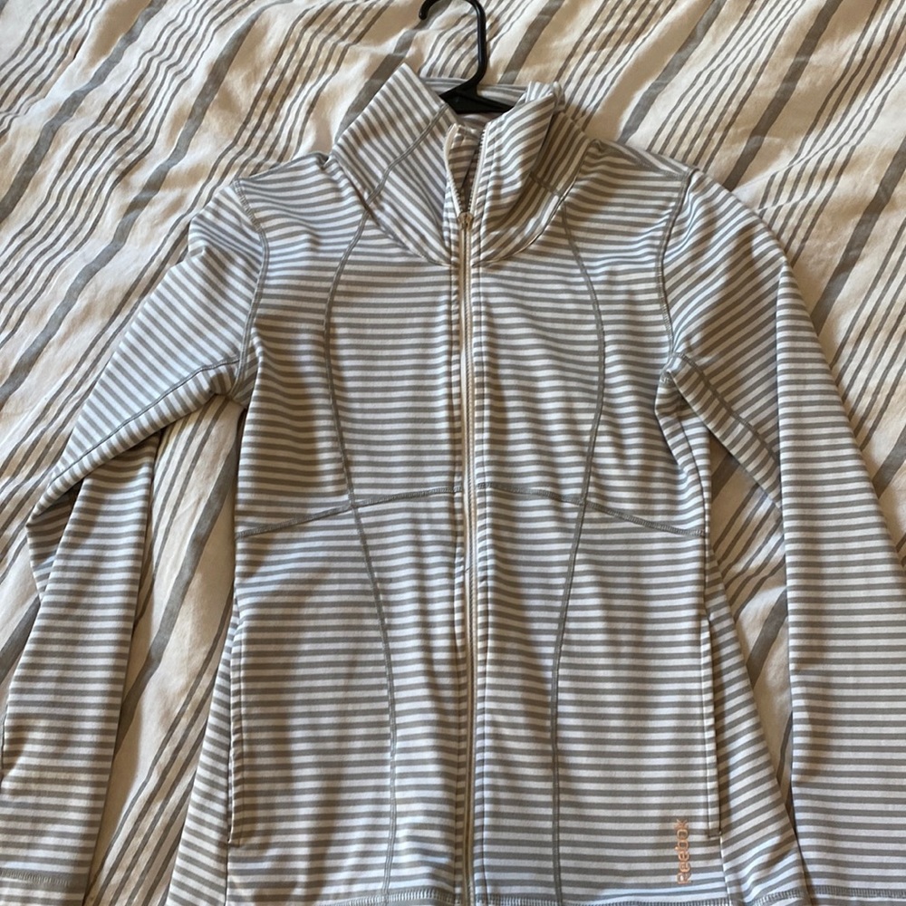 Small Reebok zip up jacket